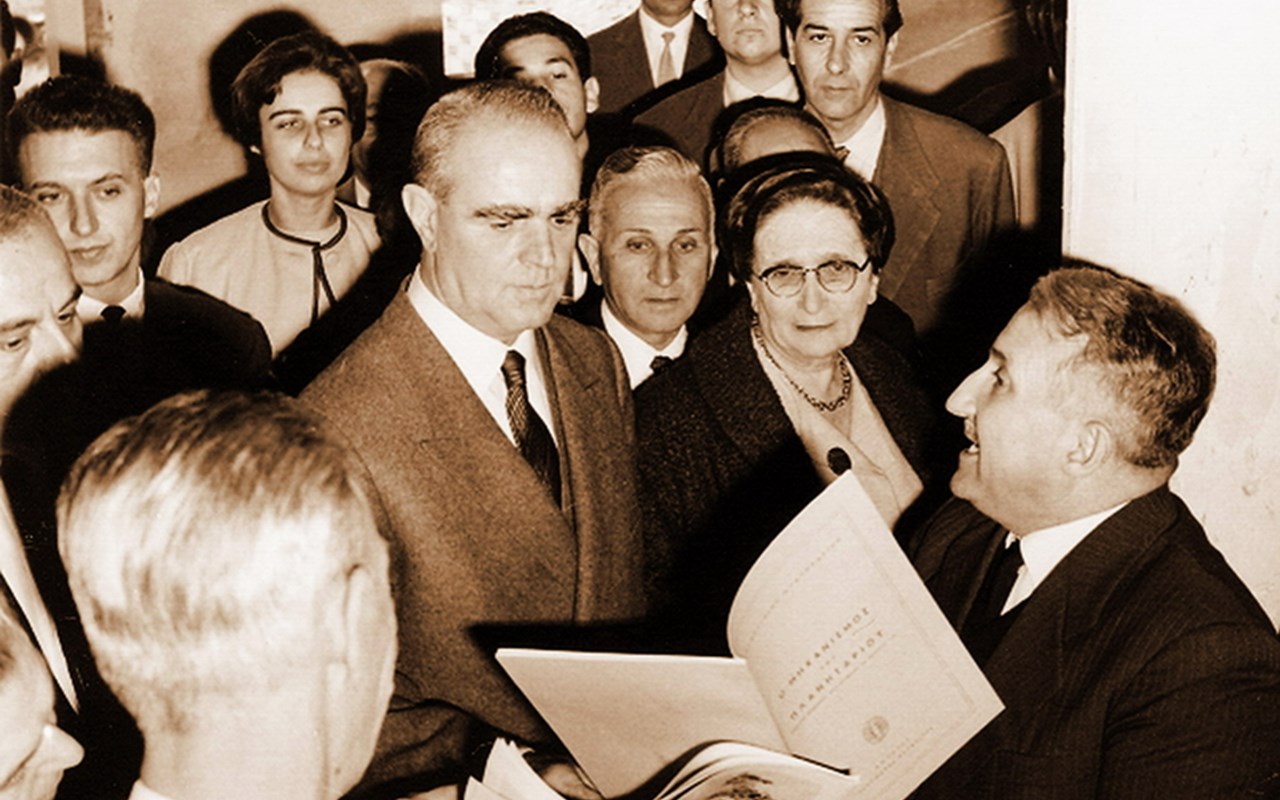 Dimitrios Kotsakis and Marianthi Simou give prime minister Konstantinos Karamanlis a tour of the Eugenides Foundation Planetarium during its construction (1962). 